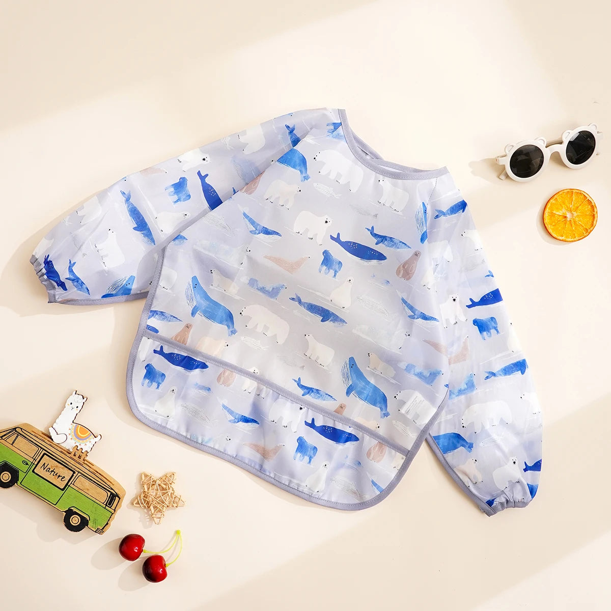 Bavoir imperméable à manches longues